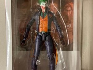 The Joker Dceased Dc Essentials Action Figure 18 Cm